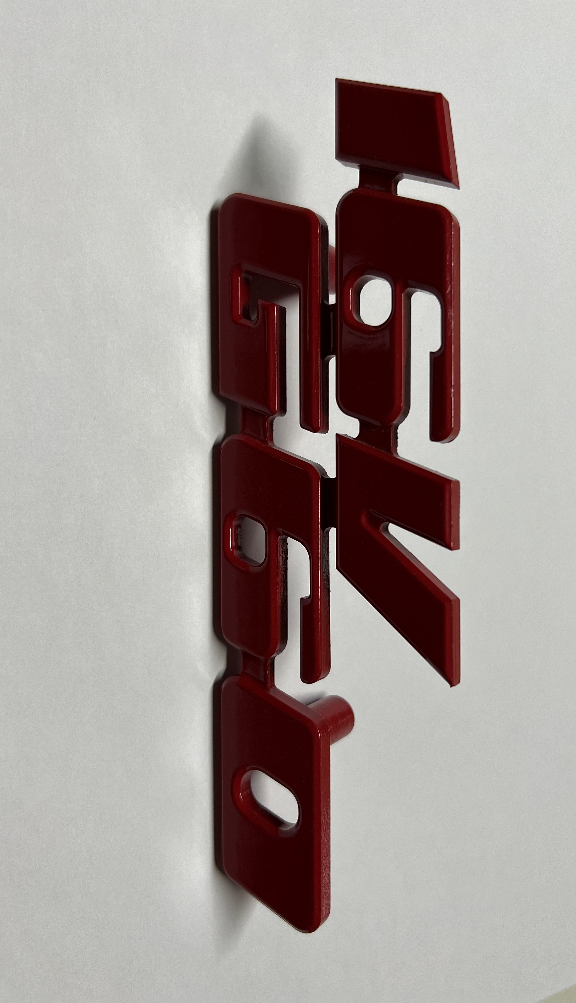 Emblem für den 16VG60 Kühlergrill aus Aluminium