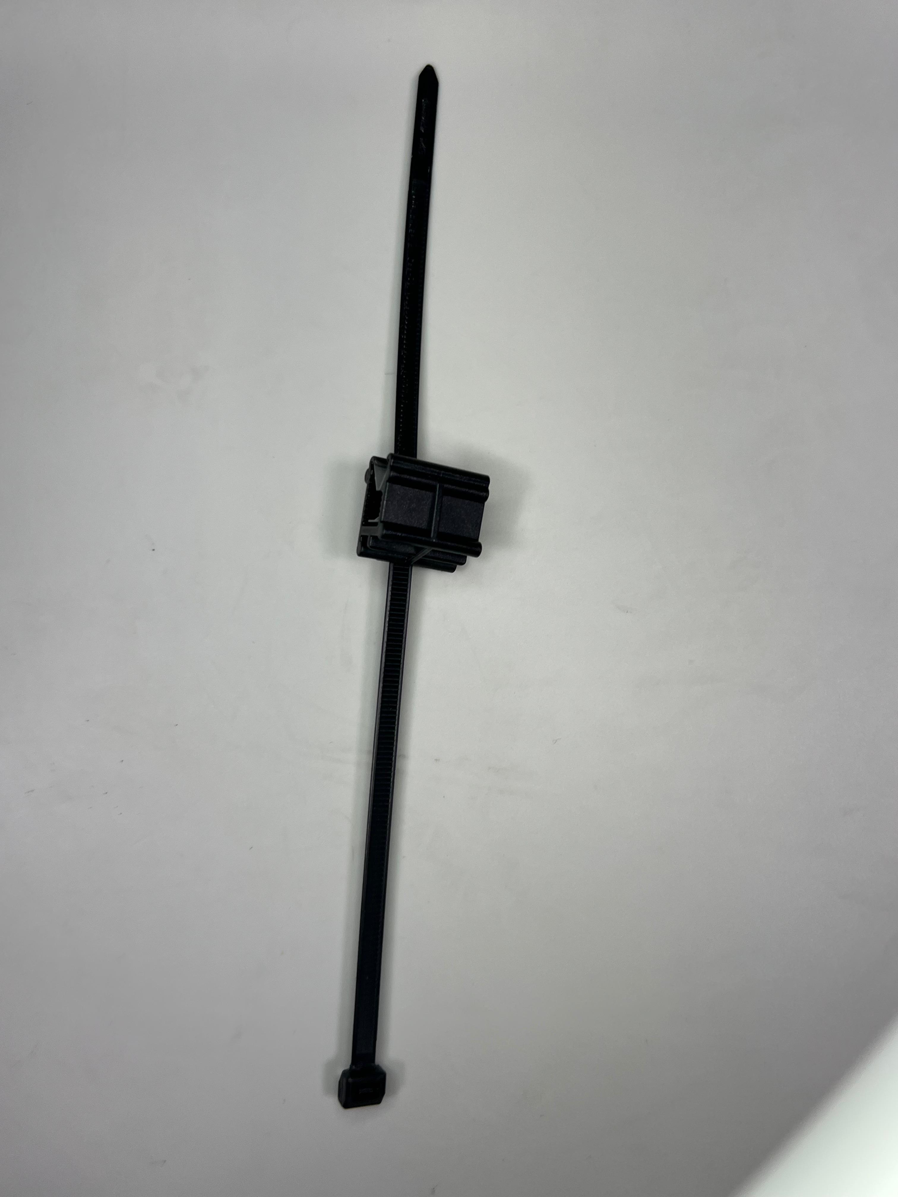 Kabelbinder mit Halteklammer für das Handbremsseil Polo 86c