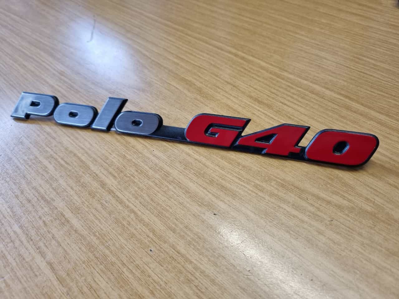 Hinterer Schriftzug Emblem für Polo G40 für VW Polo 2F mit der Teilenummer : 871 853 687 E