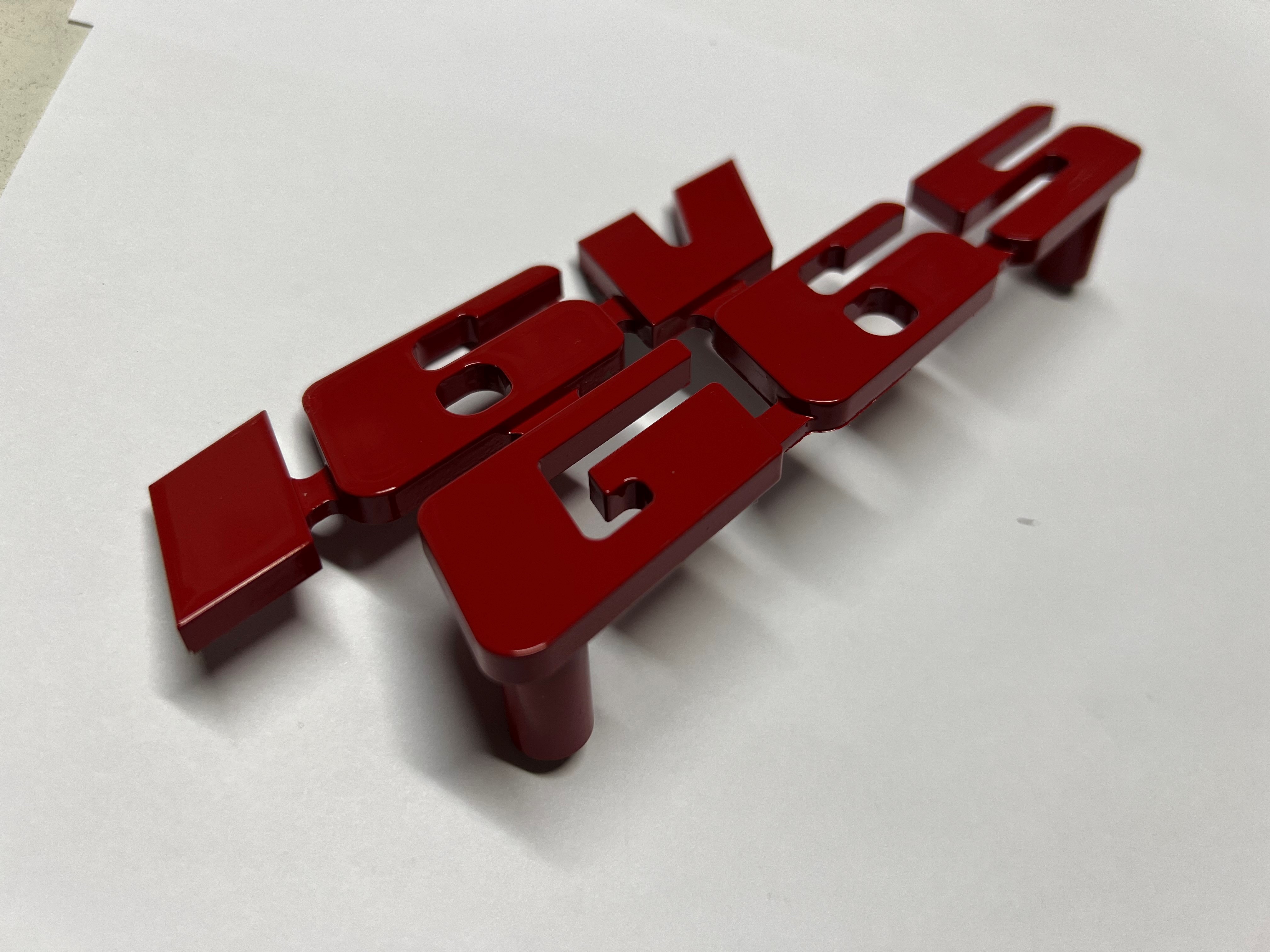 Emblem für den 16VG65 Kühlergrill aus Aluminium