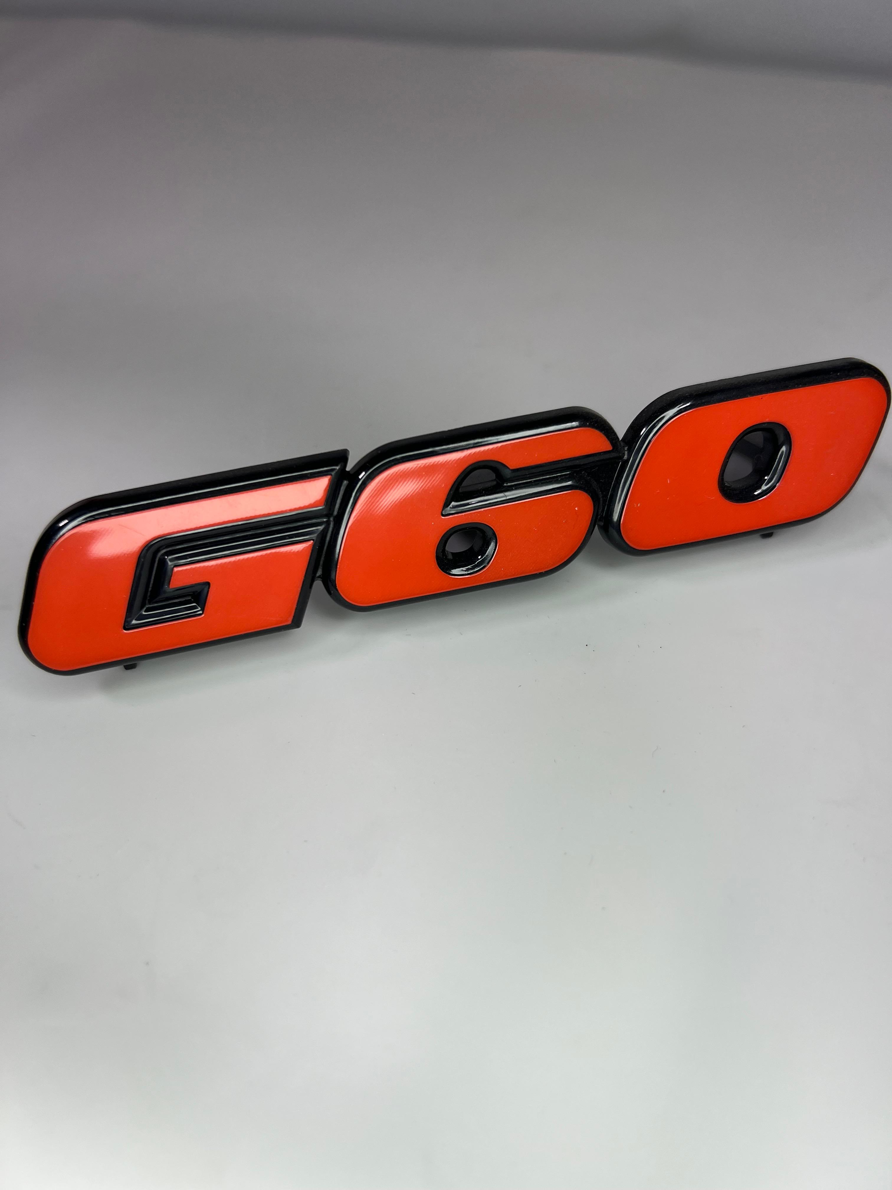 Emblem für den G60 Kühlergrill aus Kunststoff für Passat 35i Corrado Golf II 19E in der Farbe  rot