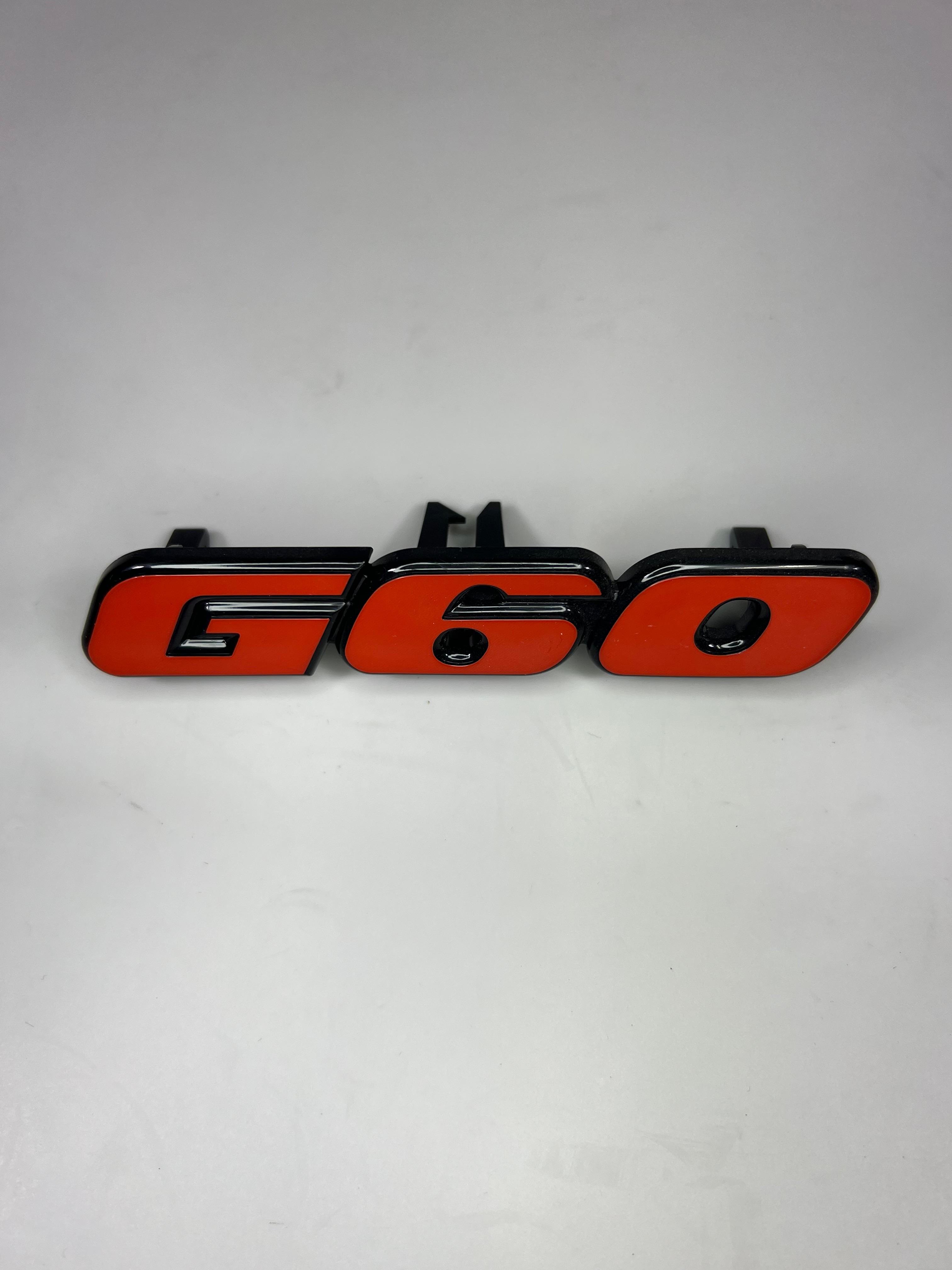 Emblem für den G60 Kühlergrill aus Kunststoff für Passat 35i Corrado Golf II 19E in der Farbe  rot