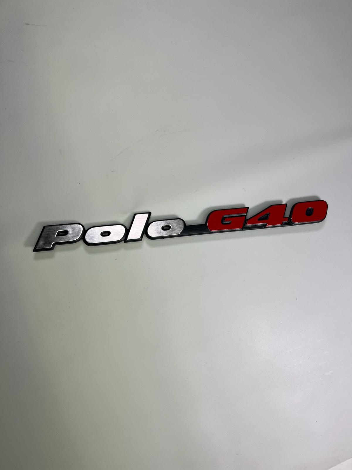 Hinterer Schriftzug Emblem für Polo G40 für VW Polo 2F mit der Teilenummer : 871 853 687 E