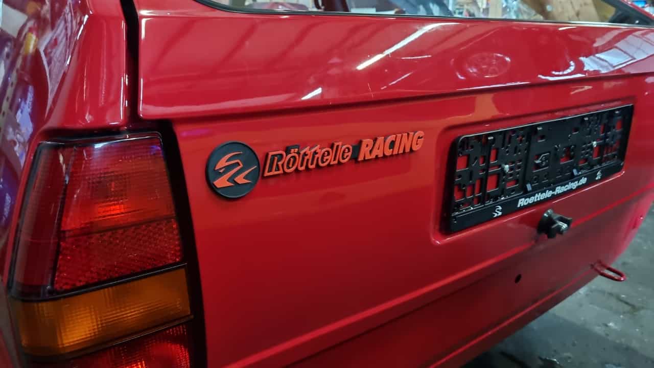 Emblem Röttele Racing mit Logo aus Kunststoff zum Kleben