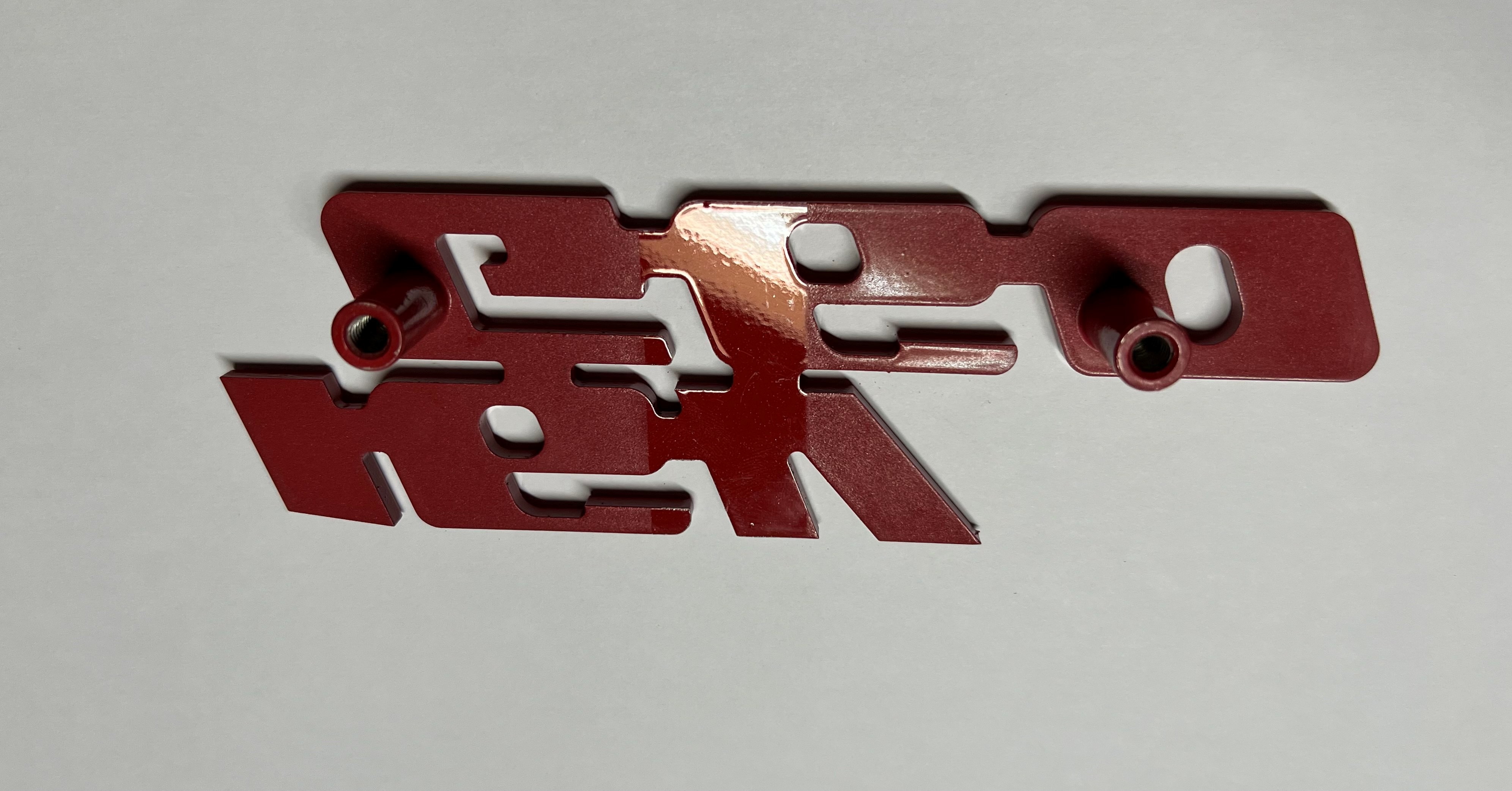 Emblem für den 16VG60 Kühlergrill aus Aluminium