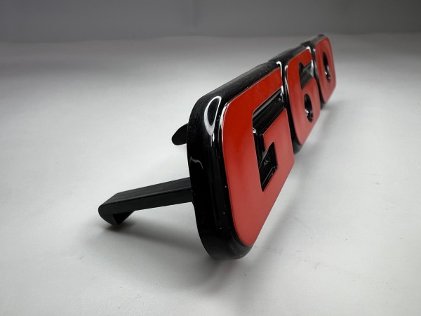 Emblem für den G60 Kühlergrill aus Kunststoff für Passat 35i Corrado Golf II 19E in der Farbe rot 