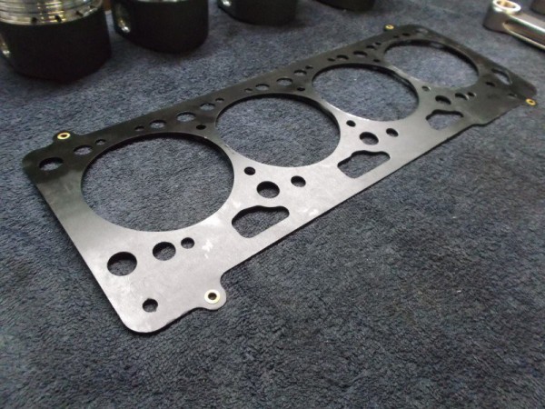 Zylinderkopfdichtung aus Metall für Polo G40 Motorkennbuchstabe: PY Maximaler Bohrdurchmesser: 77,5 mm Dicke: 0,5 mm