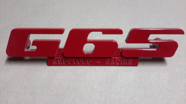 Emblem für den G65 Kühlergrill aus Aluminium mit Werbung